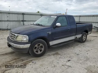 2002 Ford F-150 XL z VIN 1FTRX17L42NA56117, wystawiony jako Copart lot #56785945 z przebiegiem 169 107 mil mil oraz Czysty tytuł • Clean title. Historia ofert i sprzedaży dostępna na DreamBid. Obrazek 1.