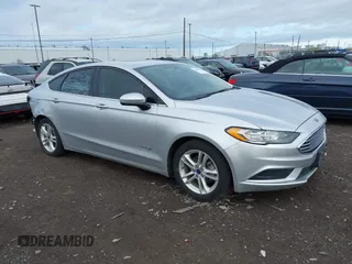 2018 Ford Fusion SE z VIN 3FA6P0LU2JR161168, wystawiony jako IAAI lot #42256935 z przebiegiem 79 600 mil mil oraz . Historia ofert i sprzedaży dostępna na DreamBid. Obrazek 1.