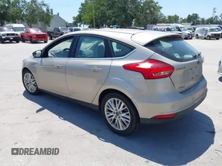 2017 Ford Focus Titanium с VIN 1FADP3N21HL327581, выставлен на аукционе IAAI как лот 42342179 с пробегом 61 489 миль миль и . История ставок и продаж доступна на DreamBid. Изображение 3.