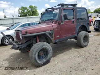 2002 Jeep Wrangler X with VIN 1J4FA39SX2P732881, listed as a Copart auction lot 64451185 with Not provided miles and Clean title. Bid and sale history available at DreamBid. Image 1.