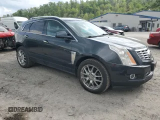 2014 Cadillac SRX Premium Collection with VIN 3GYFNGE3XES560903, listed as a Copart auction lot 52529525 with 117,780 mi miles and Salvage title. Bid and sale history available at DreamBid. Image 4.
