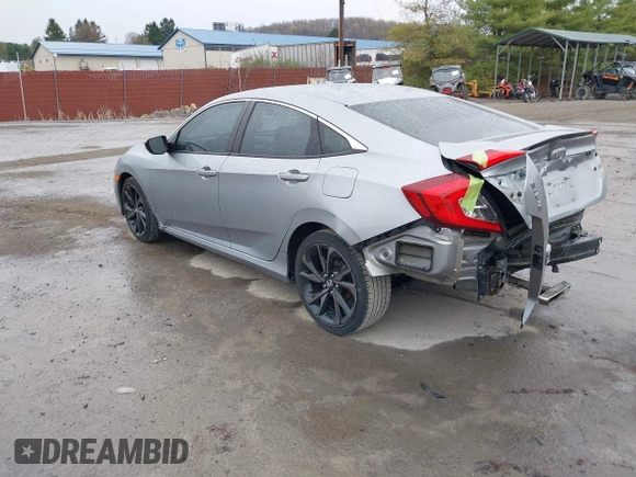 2019 Honda Civic Sport with VIN 19XFC2F81KE034047, listed as a IAAI auction lot 41995614 with 91,303 mi miles and . Bid and sale history available at DreamBid. Image 3.
