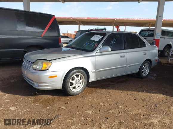 2003 Hyundai Accent GL with VIN KMHCG45C93U476176, listed as a IAAI auction lot 41940608 with 212,264 mi miles. Bid and sale history available at carsss.com. Image 2.