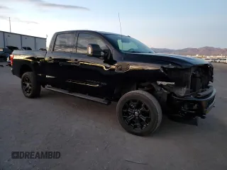 2018 Nissan Titan XD PRO-4X with VIN 1N6BA1F48JN521832, listed as a Copart auction lot 82158304 with 120,768 mi miles and Salvage Title. Bid and sale history available at carsss.com. Image 4.
