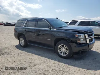 2020 Chevrolet Tahoe LT with VIN 1GNSKBKC2LR111551, listed as a Copart auction lot 57147985 with 134,867 mi miles and Salvage title. Bid and sale history available at DreamBid. Image 4.