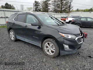 2021 Chevrolet Equinox LT z VIN 3GNAXKEV4ML358198, wystawiony jako Copart lot #55668225 z przebiegiem 71 690 mil mil oraz Szkoda całkowita • Salvage title. Historia ofert i sprzedaży dostępna na DreamBid. Obrazek 4.