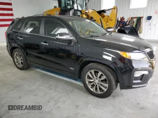 2013 Kia Sorento SX z VIN 5XYKWDA23DG369367, wystawiony jako Copart lot #57721075 z przebiegiem 133 560 mil mil oraz Szkoda całkowita • Salvage title. Historia ofert i sprzedaży dostępna na DreamBid. Obrazek 4.