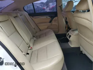 2012 Acura TL Technology z VIN 19UUA8F52CA033582, wystawiony jako Copart lot #54488805 z przebiegiem 146 417 mil mil oraz Czysty tytuł • Clean title. Historia ofert i sprzedaży dostępna na DreamBid. Obrazek 10.