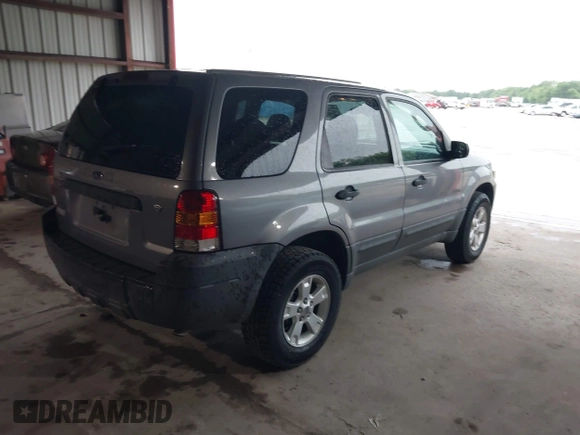 2007 Ford Escape XLT with VIN 1FMYU03187KA14931, listed as a IAAI auction lot 42198989 with 89,023 mi miles and . Bid and sale history available at DreamBid. Image 4.