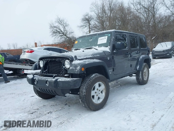2016 Jeep Wrangler Unlimited Rubicon with VIN 1C4BJWFG7GL192698, listed as a IAAI auction lot 41603236 with 69,620 mi miles. Bid and sale history available at carsss.com. Image 2.