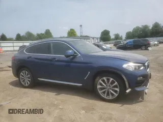 2019 BMW X4 xDrive30i with VIN 5UXUJ3C52KLG51818, listed as a Copart auction lot 59573625 with 77,841 mi miles and Salvage title. Bid and sale history available at DreamBid. Image 14.