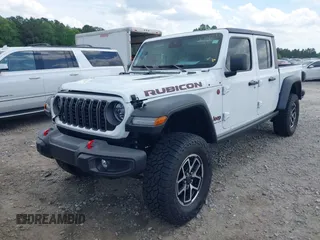 2024 Jeep Gladiator Rubicon z VIN 1C6JJTBG5RL110865, wystawiony jako IAAI lot #42104829 z przebiegiem 6 815 mil mil oraz . Historia ofert i sprzedaży dostępna na DreamBid. Obrazek 17.
