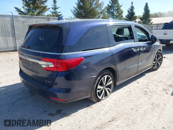 2020 Honda Odyssey Elite with VIN 5FNRL6H95LB052590, listed as a IAAI auction lot 42231280 with 65,165 mi miles and . Bid and sale history available at DreamBid. Image 4.