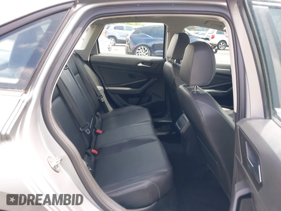 2019 Volkswagen Jetta S with VIN 3VWC57BU2KM215738, listed as a IAAI auction lot 42131376 with 52,720 mi miles and . Bid and sale history available at DreamBid. Image 8.