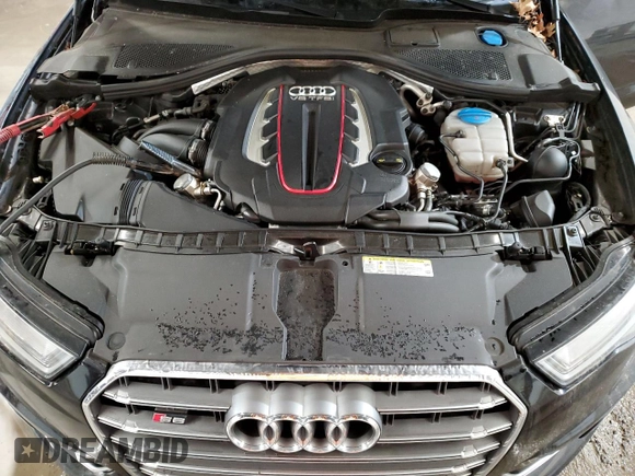 2018 Audi S6 Premium Plus z VIN WAUFFAFC3JN069671, wystawiony jako Copart lot #86125084 z przebiegiem Nie podano mil oraz Szkoda całkowita • Salvage title. Historia ofert i sprzedaży dostępna na DreamBid. Obrazek 11.
