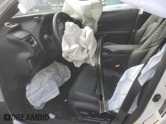 2021 Lexus UX 250h z VIN JTHX9JBH1M2037919, wystawiony jako Copart lot #46970385 z przebiegiem Nie podano mil oraz Szkoda całkowita • Salvage title. Historia ofert i sprzedaży dostępna na DreamBid. Obrazek 7.
