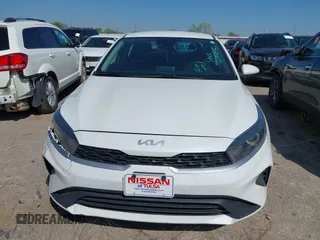 2022 Kia Forte LXS z VIN 3KPF24AD1NE479654, wystawiony jako IAAI lot #41950997 z przebiegiem 71 168 mil mil oraz . Historia ofert i sprzedaży dostępna na DreamBid. Obrazek 12.