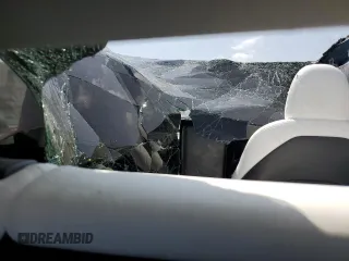 2022 Tesla Model Y Long Range z VIN 7SAYGDEE8NF447410, wystawiony jako Copart lot #54860765 z przebiegiem Nie podano mil oraz Szkody całkowita. Historia ofert i sprzedaży dostępna na DreamBid. Obrazek 8.
