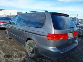2000 Honda Odyssey EX with VIN 2HKRL1863YH621471, listed as a IAAI auction lot 41702650 with 167,050 mi miles and . Bid and sale history available at DreamBid. Image 3.