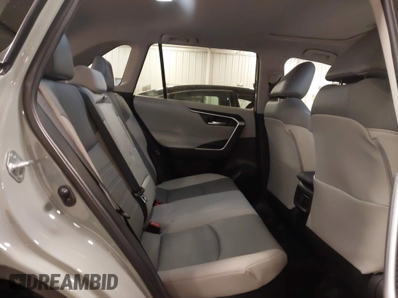 2023 Toyota RAV4 Hybrid XLE Premium z VIN 4T3B6RFV0PU118506, wystawiony jako IAAI lot #41972785 z przebiegiem 16 496 mil mil oraz . Historia ofert i sprzedaży dostępna na DreamBid. Obrazek 8.