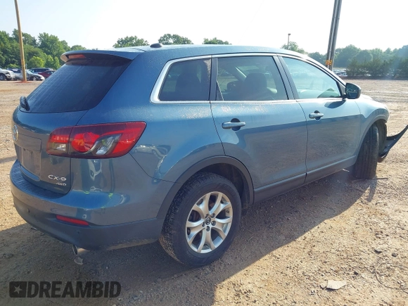 2014 Mazda CX-9 Touring with VIN JM3TB3CV7E0435659, listed as a IAAI auction lot 42428247 with 124,523 mi miles and . Bid and sale history available at DreamBid. Image 4.