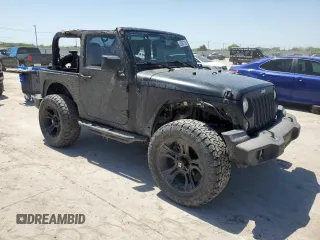 2015 Jeep Wrangler Sport with VIN 1C4GJWAG8FL563198, listed as a Copart auction lot 52867385 with 47,854 mi miles and Salvage title. Bid and sale history available at DreamBid. Image 4.