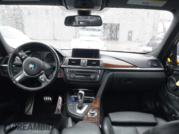 2013 BMW 3 Series 335i xDrive with VIN WBA3B9C54DF586608, listed as a IAAI auction lot 41933738 with 133,423 mi miles. Bid and sale history available at carsss.com. Image 5.