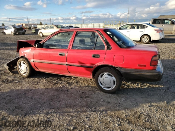 1990 Toyota Corolla z VIN 1NXAE94A6LZ127972, wystawiony jako Copart lot #80673204 z przebiegiem 186 993 mil mil oraz Szkoda całkowita • Salvage title. Historia ofert i sprzedaży dostępna na DreamBid. Obrazek 2.