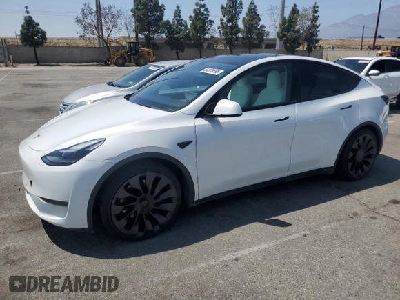 2022 Tesla Model Y Performance with VIN 7SAYGDEFXNF407340, listed as a Copart auction lot 54376895 with 56,709 mi miles and Salvage Title. Bid and sale history available at DreamBid. Image 1.