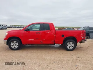 2012 Toyota Tundra z VIN 5TFUM5F11CX028307, wystawiony jako IAAI lot #41952532 z przebiegiem 253 254 mil mil oraz . Historia ofert i sprzedaży dostępna na DreamBid. Obrazek 14.