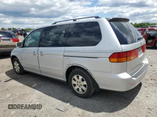 2003 Honda Odyssey EX z VIN 5FNRL186X3B075761, wystawiony jako Copart lot #58289815 z przebiegiem 137 763 mil mil oraz Szkoda całkowita • Salvage title. Historia ofert i sprzedaży dostępna na DreamBid. Obrazek 2.