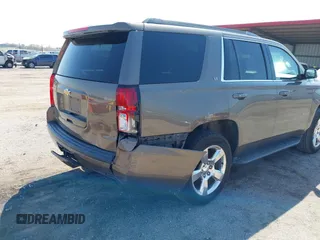 2016 Chevrolet Tahoe LT with VIN 1GNSKBKC9GR434579, listed as a IAAI auction lot 42080094 with 137,910 mi miles and . Bid and sale history available at DreamBid. Image 6.