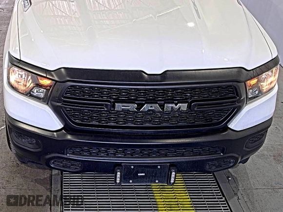 2023 Ram 1500 Tradesman with VIN 1C6RRFGG5PN620477, listed as a IAAI auction lot 42610477 with 18,553 mi miles and . Bid and sale history available at DreamBid. Image 1.