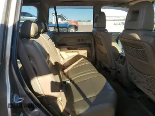 2005 Honda Pilot EX-L z VIN 5FNYF18525B064752, wystawiony jako Copart lot #56022115 z przebiegiem 221 161 mil mil oraz Szkoda całkowita • Salvage title. Historia ofert i sprzedaży dostępna na DreamBid. Obrazek 11.