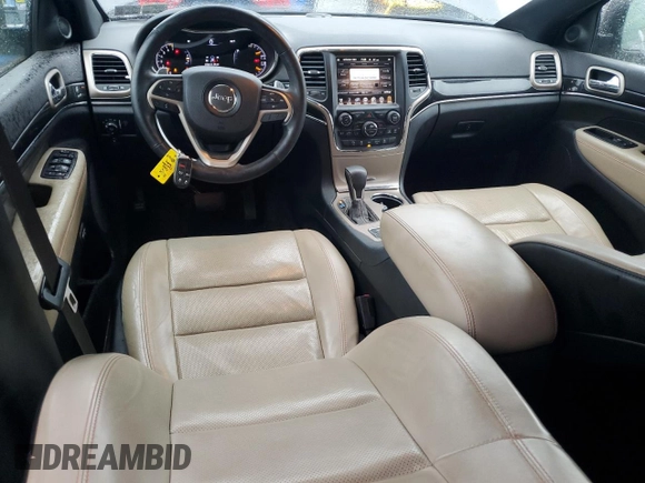 2016 Jeep Grand Cherokee Limited 75th Anniversary with VIN 1C4RJFBGXGC482082, listed as a Copart auction lot 56217165 with 80,787 mi miles and Salvage Title. Bid and sale history available at DreamBid. Image 8.