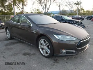 2014 Tesla Model S 60 z VIN 5YJSA1H19EFP51406, wystawiony jako IAAI lot #41561395 z przebiegiem Nie podano mil oraz . Historia ofert i sprzedaży dostępna na DreamBid. Obrazek 1.