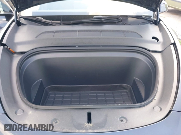 2024 Tesla Model Y with VIN 7SAYGDED9RA321373, listed as a IAAI auction lot 42228491 with 6,452 mi miles and . Bid and sale history available at DreamBid. Image 10.