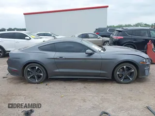 2021 Ford Mustang EcoBoost with VIN 1FA6P8TH1M5152941, listed as a IAAI auction lot 42110646 with 26,673 mi miles and . Bid and sale history available at DreamBid. Image 13.