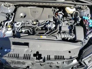 2025 Toyota Camry LE z VIN 4T1DAACK8SU045860, wystawiony jako Copart lot #84733224 z przebiegiem 9 386 mil mil oraz Szkoda całkowita • Salvage title. Historia ofert i sprzedaży dostępna na DreamBid. Obrazek 12.