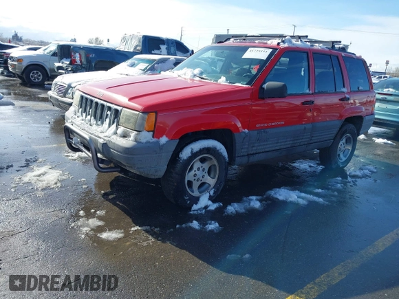 1996 Jeep Grand Cherokee Laredo with VIN 1J4GZ58Y8TC374929, listed as a IAAI auction lot 41725111 with 196,723 mi miles. Bid and sale history available at carsss.com. Image 2.