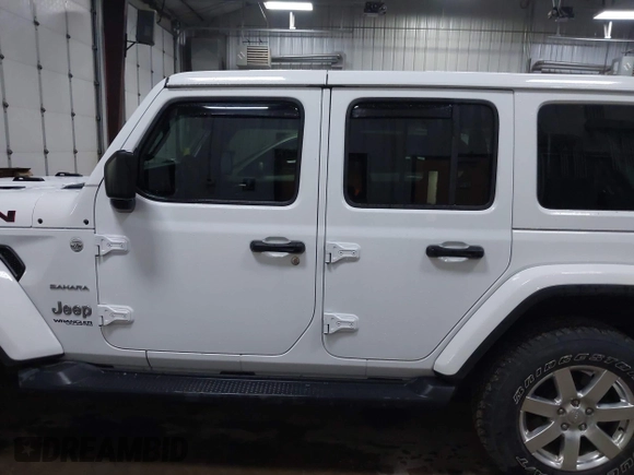2018 Jeep Wrangler Unlimited Sahara z VIN 1C4HJXEG3JW117990, wystawiony jako IAAI lot #42290861 z przebiegiem 86 907 mil mil oraz . Historia ofert i sprzedaży dostępna na DreamBid. Obrazek 14.