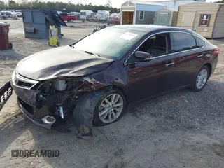 2013 Toyota Avalon XLE with VIN 4T1BK1EB1DU026863, listed as a IAAI auction lot 41644969 with 190,020 mi miles and . Bid and sale history available at DreamBid. Image 2.