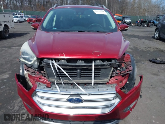 2017 Ford Escape Titanium with VIN 1FMCU0JD9HUC71738, listed as a IAAI auction lot 41673228 with 173,615 mi miles. Bid and sale history available at carsss.com. Image 12.