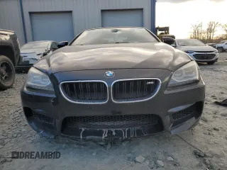 2015 BMW M6 z VIN WBSLZ9C58FD651420, wystawiony jako Copart lot #43480755 z przebiegiem 134 753 mil mil oraz Czysty tytuł • Clean title. Historia ofert i sprzedaży dostępna na DreamBid. Obrazek 11.