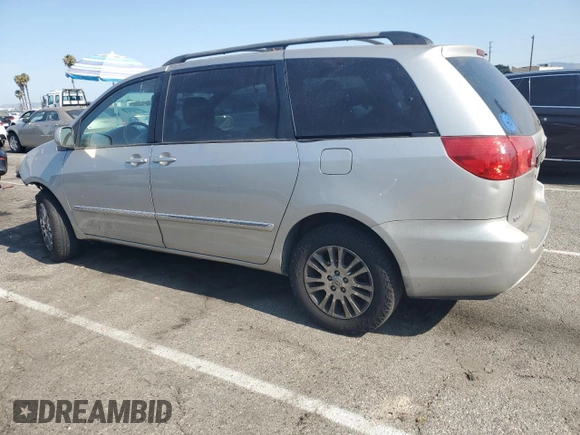 2010 Toyota Sienna XLE with VIN 5TDDK4CC8AS032007, listed as a Copart auction lot 65611495 with 299,904 mi miles and Salvage title. Bid and sale history available at DreamBid. Image 2.