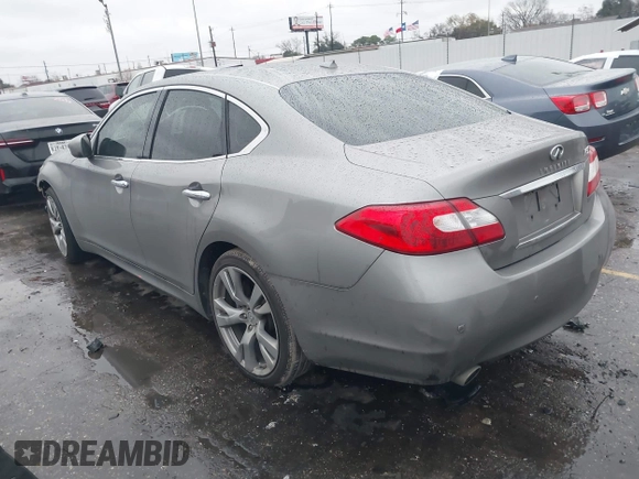 2013 Infiniti M37 with VIN JN1BY1AP7DM511497, listed as a IAAI auction lot 41294499 with 174,977 mi miles. Bid and sale history available at carsss.com. Image 3.