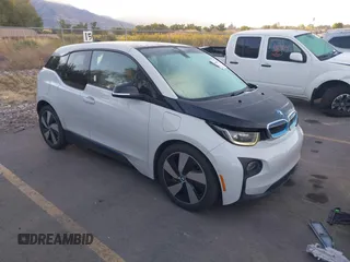 2015 BMW i3 with VIN WBY1Z4C52FV503063, listed as a IAAI auction lot 40644359 with 77,009 mi miles. Bid and sale history available at carsss.com. Image 1.