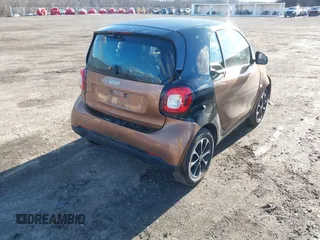 2016 Smart fortwo Passion with VIN WMEFJ5DA6GK079651, listed as a IAAI auction lot 41607293 with 146,753 mi miles and . Bid and sale history available at DreamBid. Image 4.