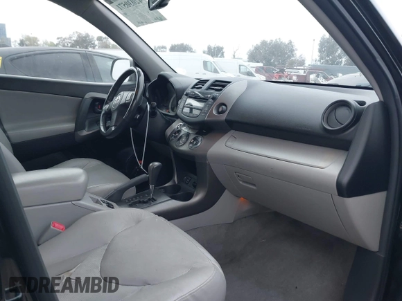 2009 Toyota RAV4 Ltd with VIN JTMZK31VX9D001644, listed as a IAAI auction lot 42030571 with 186,844 mi miles. Bid and sale history available at carsss.com. Image 5.