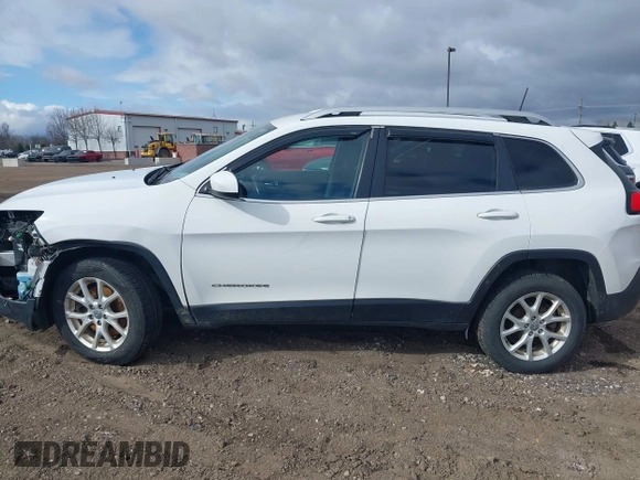 2016 Jeep Cherokee 75th Anniversary with VIN 1C4PJLCB4GW287862, listed as a IAAI auction lot 42030424 with 132,812 mi miles and . Bid and sale history available at DreamBid. Image 14.
